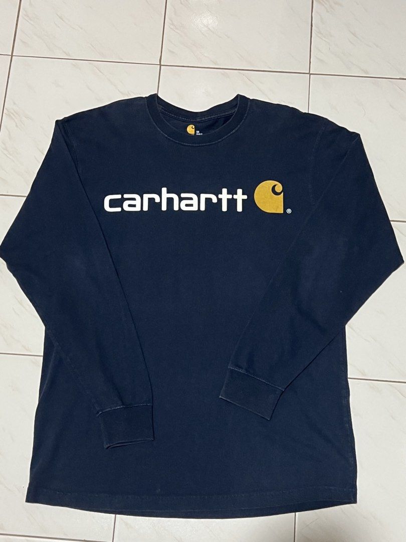 Carhartt Longsleeve K298 (Category: Tshirts & Polo Shirts ) located in Cabuyao City. Submitted by kenzythrift_ (Listing ID 1462949180, Image 1). Description: Carhartt Longsleeve K298 NVY Made in Dominican Republic 22x30 actual dimes very good condition 1200 + sf J&T courier Loc: Butong, Cabuyao City, Laguna.