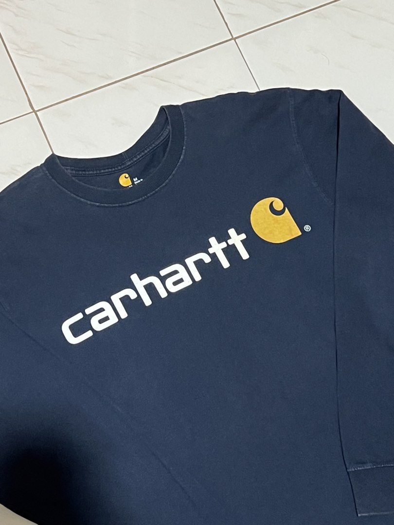 Carhartt Longsleeve K298 (Category: Tshirts & Polo Shirts ) located in Cabuyao City. Submitted by kenzythrift_ (Listing ID 1462949180, Image 2). Description: Carhartt Longsleeve K298 NVY Made in Dominican Republic 22x30 actual dimes very good condition 1200 + sf J&T courier Loc: Butong, Cabuyao City, Laguna.