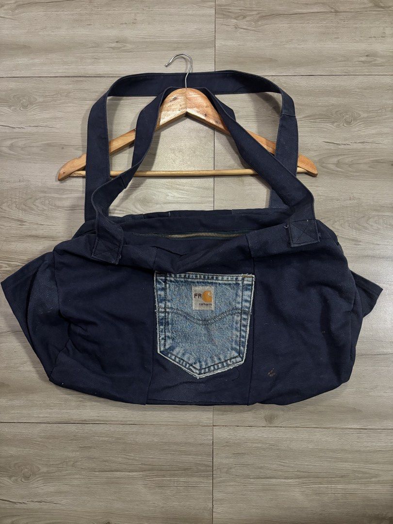 Carhartt reworked duffle bag (Category: Belt bags, Clutches and Pouches) located in Cavite. Submitted by cesxyyylll (Listing ID 1462898721, Image 1). Description: Need wash All material Carhartt 🪡 .