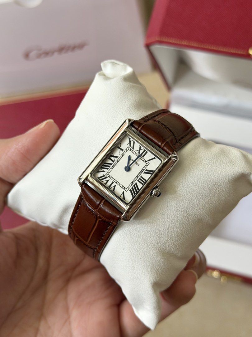 Cartier Tank Leather Watch (Category: Women's Watches) located in Manila. Submitted by daughterofahoarder (Listing ID 1462344050, Image 2). Description: Please do your own research and use your own judgment before purchasing & asking about authenticity. 🙂 - Like new and fully working. Condition 10/10, no issues! - Complete inclusions: box, paper bag, booklet/cards.