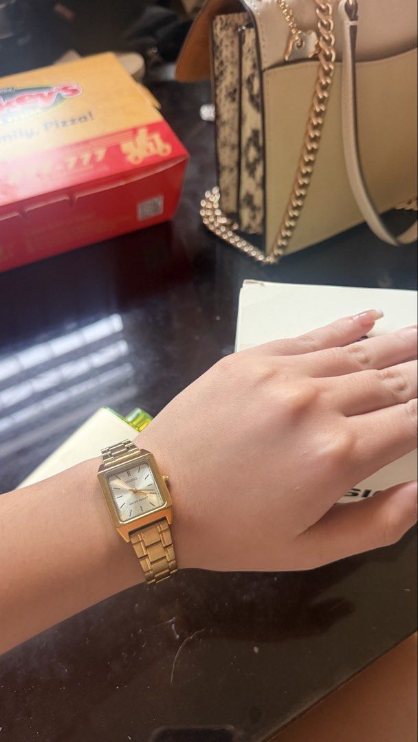 Casio Gold Square Face Watch (Category: Women's Watches) located in Marikina City. Submitted by chieana_pineda (Listing ID 1462972556, Image 2). Description: - Authentic Gold Casio Watch - Classic Square Face Design - Durable Stainless Steel Band - Includes Original Box - Versatile for everyday wear or special occasions - Timeless and easy to style.