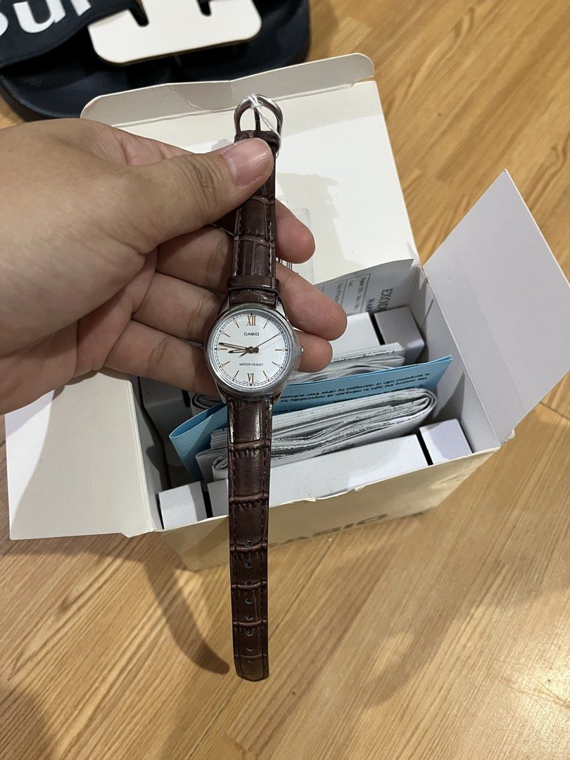 Casio Water Resist Watch with Brown Leather Strap (Category: Women's Watches) located in Cebu City. Submitted by maryjoyieeflores (Listing ID 1463046664, Image 2). Description: - Classic Casio Watch - White Face with Roman Numerals - Brown Leather Strap - Water Resistant - Includes Original Box (a bit dusty) and Manual - Price: P999 (non negotiable) - Feel free to send a message for any questions!.