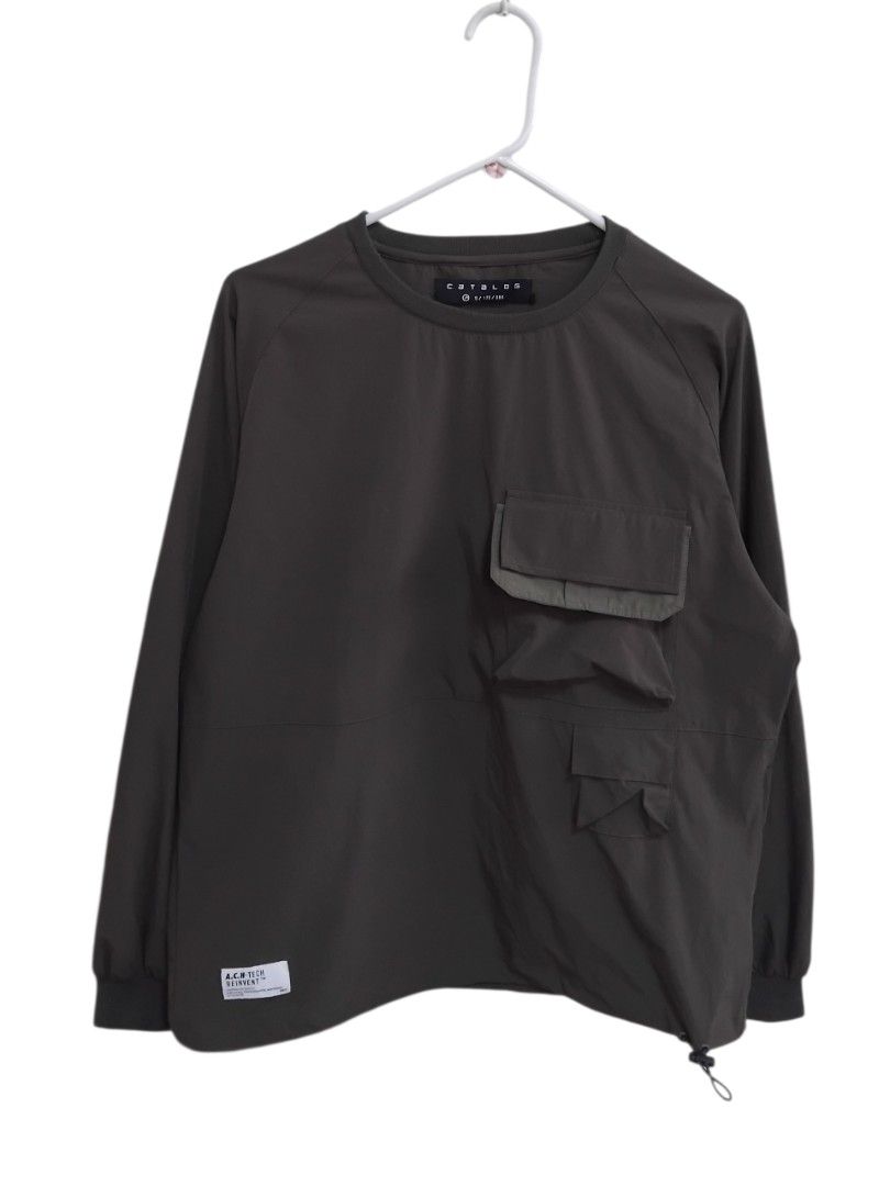Catalog HK Nylon Outdoor Utility Tech Pullover (Category: Tshirts & Polo Shirts ) located in Pasig City. Submitted by hustlexcurate (Listing ID 1462999064, Image 1). Description: Catalog HK Nylon Outdoor Utility Tech Pullover Size S on tag fits MEDIUM Dimensions: 23X27.
