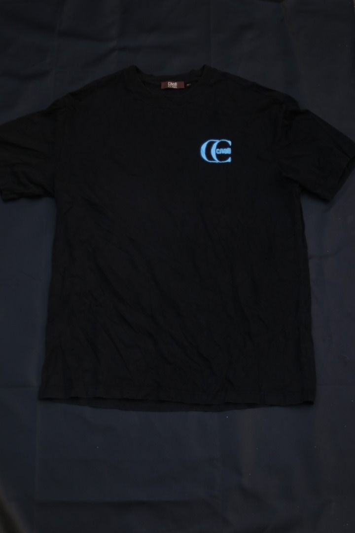 Cavalli Class Black T-Shirt with Blue Logo (Category: Tshirts & Polo Shirts ) located in Taguig. Submitted by kurim4w (Listing ID 1463008775, Image 1). Description: - Cavalli Class black t-shirt - Features signature blue logo on chest and back - Made from comfortable fabric - Ideal for casual wear - Brand new with tags still attached - have some discoloration in neck 22width 30length authentic 350php plus sf only taguig city location .