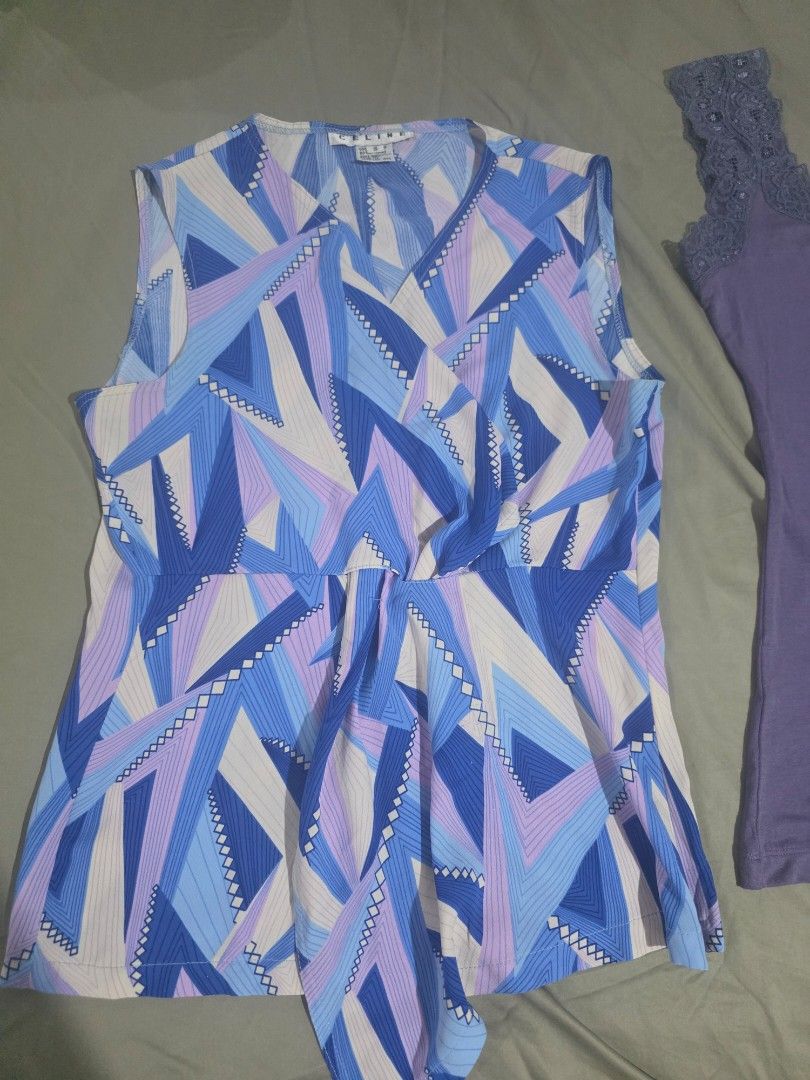 CELINE Geometric Print Top (Category: Blouses) located in Zamboanga. Submitted by Mikamisa (Listing ID 1463028051, Image 1). Description: - Authentic CELINE geometric print top - Striking shades of blue, purple, and white - Estimated size S (please check measurements) - Versatile for casual outfits or layering.