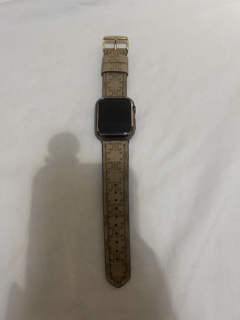 Celine Monogram Apple Watch Band 40MM (Category: Women's Watches) located in Bulacan. Submitted by kokokrunchynft (Listing ID 1462905788, Image 3). Description: - Authentic Celine monogram print leather strap. Re-worked from Auth Celine Bag. - Designed for Apple Watch - Elegant gold buckle closure - Includes both the top and bottom parts of the strap - Adds a touch of luxury and style to your wrist -Apple Watch NOT INCLUDED.
