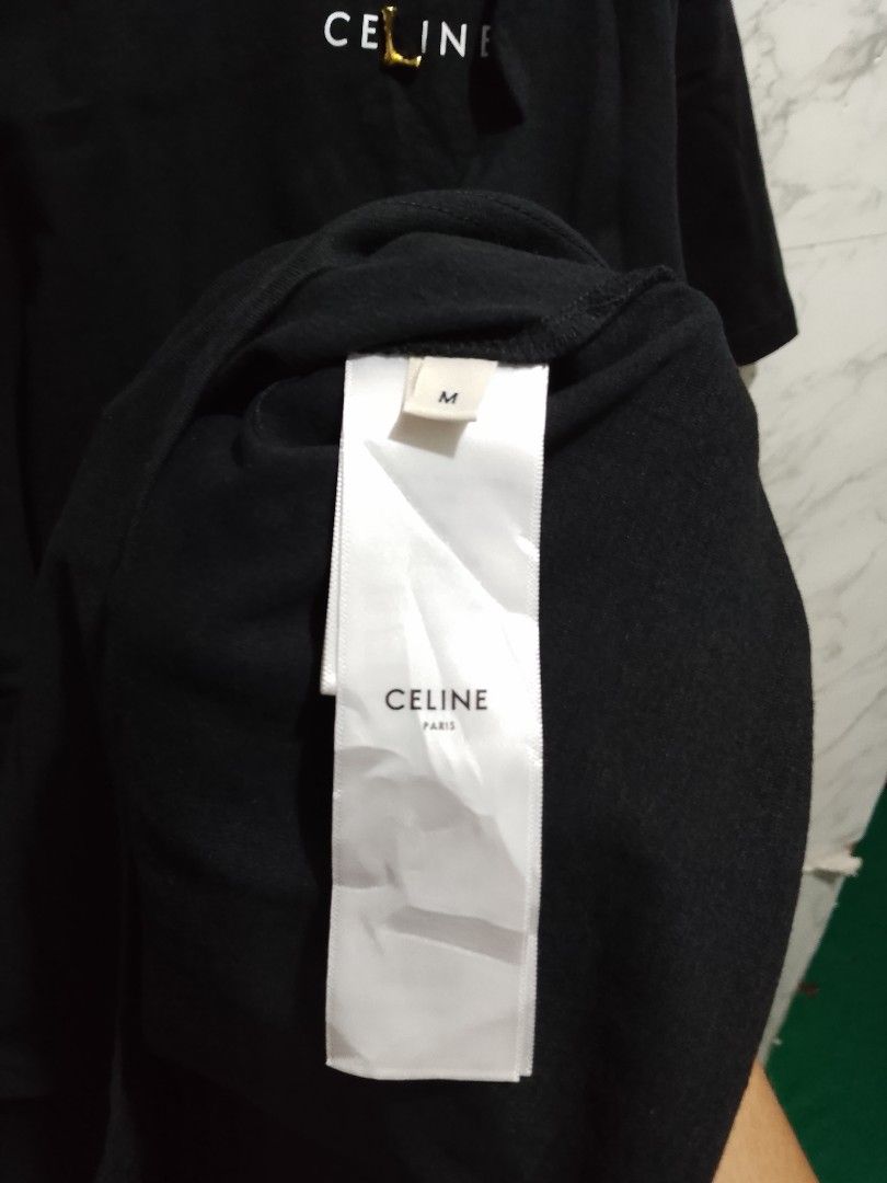 Celine Spellout T-shirt (Category: Tshirts & Polo Shirts ) located in Paranaque City. Submitted by lanceee.999 (Listing ID 1462935599, Image 3). Description: Size: M Dimes: W23 L29 Complete Tags Off/Authentic No Issue Color Rate: 9/10 Good Condition.