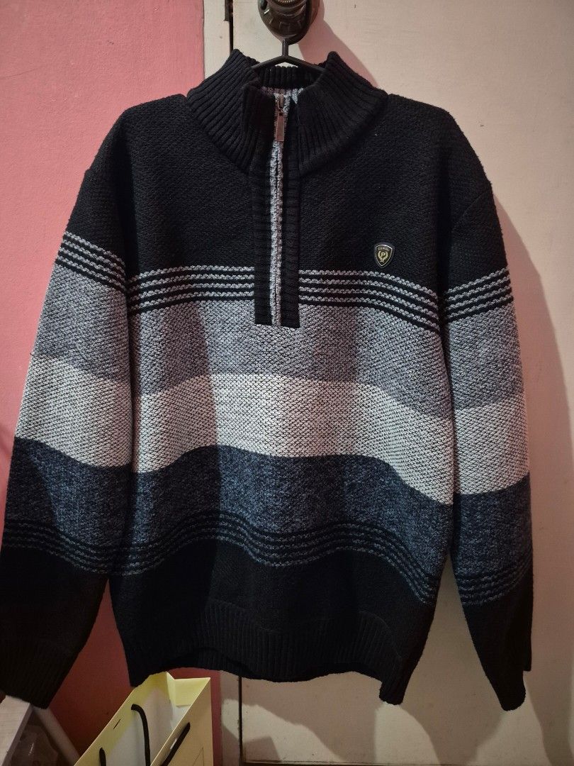 Half Zip knitted Sweater (Category: Coats, Jackets and Outerwear) located in Bulacan. Submitted by mrk_mdl (Listing ID 1463035895, Image 1). Description: - Brand: Cerini - Style: Striped Sweater - Features: Zip-up front, Mock neck - Colors: Black, Grey, White stripes - Condition: Great for cooler weather.