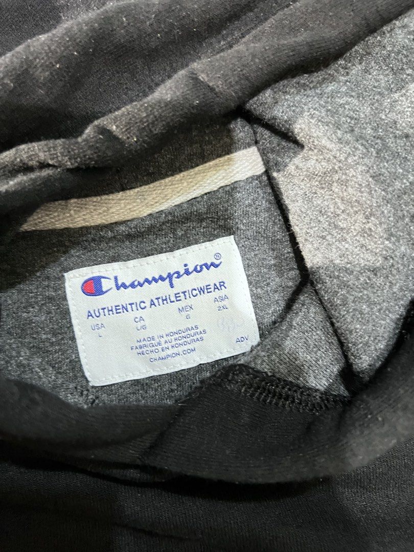 Champion Colorblock Hoodie (Category: Coats, Jackets and Outerwear) located in Binan City. Submitted by huntwear_.turtle (Listing ID 1463009078, Image 2). Description: - Champion Hoodie - Color: Black and Grey (Two-tone design) - Features: Front pocket - Material: Cotton-Polyester blend - Style: Casual wear - Size: G (fits like Asia 2XL).