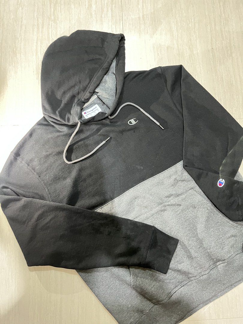 Champion Colorblock Hoodie (Category: Coats, Jackets and Outerwear) located in Binan City. Submitted by huntwear_.turtle (Listing ID 1463009078, Image 1). Description: - Champion Hoodie - Color: Black and Grey (Two-tone design) - Features: Front pocket - Material: Cotton-Polyester blend - Style: Casual wear - Size: G (fits like Asia 2XL).