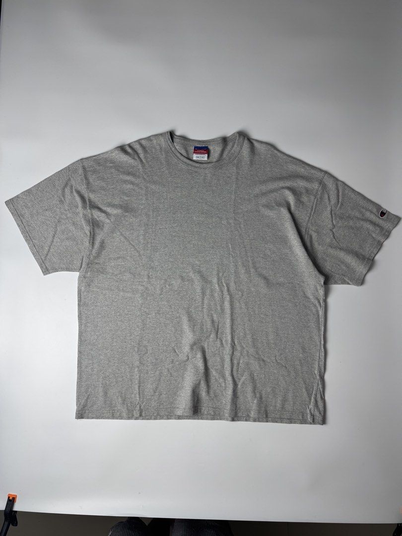 Champion Grey Oversize Shirt (Category: Tshirts & Polo Shirts ) located in Cavite. Submitted by dracokidstuff (Listing ID 1463012137, Image 1). Description: - Brand: Gildan - Color: Grey - Style: Basic T-shirt - Features: Short sleeves, crew neck - Ideal for: Everyday wear - Measurements: - Pit to pit: 26 inches - Length: 30 inches - Note: Please check measurements before purchasing..