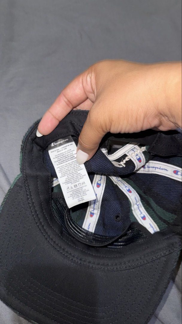 Champion Plaid Snapback Cap (Category: Caps & Hats) located in Manila. Submitted by nobleangel (Listing ID 1462920985, Image 3). Description: - Champion snapback cap - Green and navy plaid pattern - Embroidered Champion logo on front and back - Adjustable strap for a custom fit - Made in China.