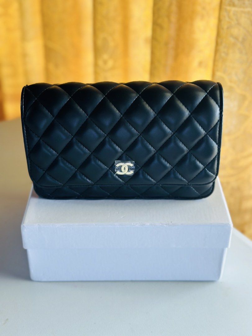 Chanel Black Quilted Leather Wallet (Category: Cross-body Bags) located in Baguio. Submitted by y_us0cutie (Listing ID 1462901861, Image 2). Description: - Authentic Chanel Wallet - Black Quilted Leather - Original Box Included - Authenticity Card Included - Classic & Timeless Design - Perfect for Everyday or Special Occasions.