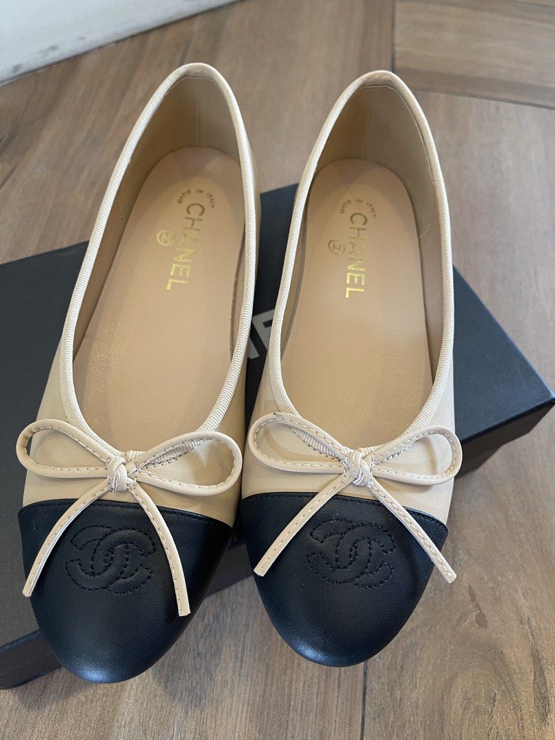 Chanel Flats (Category: Sneakers & Footwear) located in Mandaluyong City. Submitted by soarphoenix2025 (Listing ID 1462962617, Image 3). Description: brand new classic Chanel Ballerina Flats - Color: Beige and Black - Features: Iconic CC logo, bow detail on toe - Size: 38C (best fits US 6.5 to 7 womens narrow/slim feet) 24cm insole - Includes: box and dust bag Location: Mandaluyong.