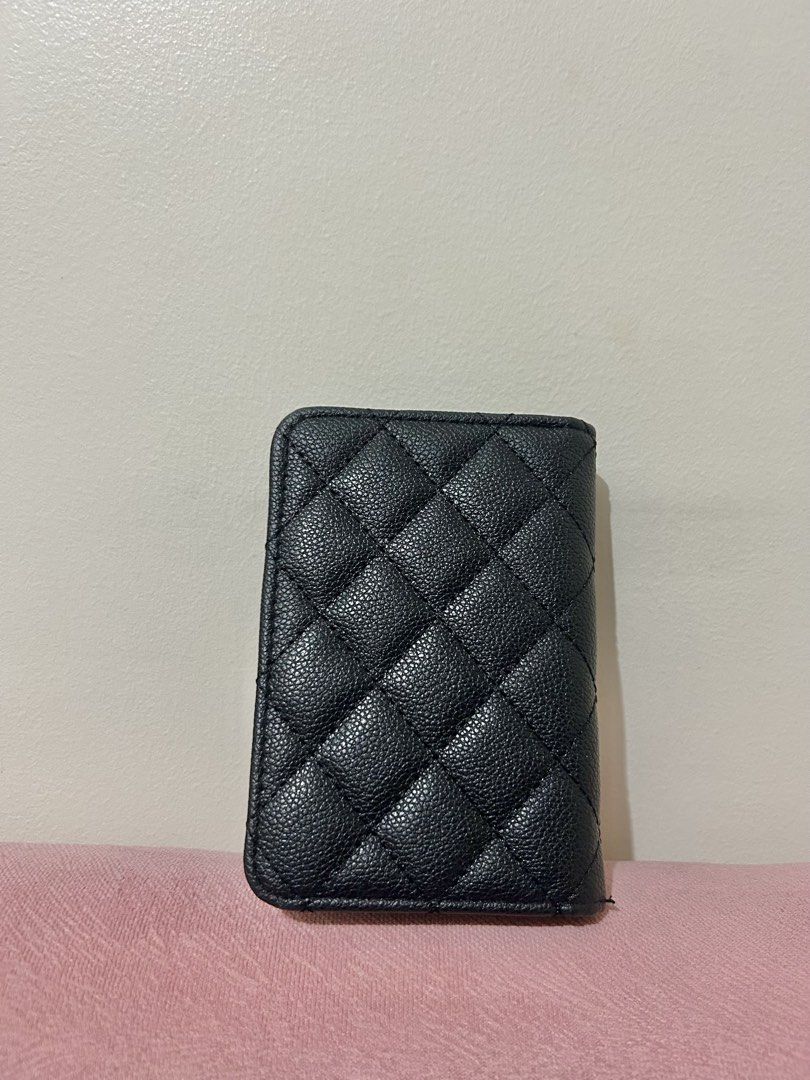 Chanel GWP Passport Holder (Category: Wallets & Card holders) located in Taguig. Submitted by janelly_ace (Listing ID 1462934604, Image 2). Description: - Chanel VIP Gift - This is a GWP please manage your expectations. - No inclusions, AGAIN, since this is a GWP. Do your own research. - Can give you a Chanel paper bag for free Actual photos posted already‼️ Front, rear, inner fold, inner side .