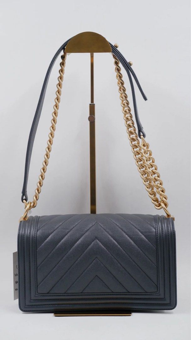 Chanel le boy old medium michip (Category: Luxury Bags & Wallets) located in Quezon City. Submitted by slluxury_ph (Listing ID 1462908298, Image 3). Description: Overall Condition: Excellent Exterior Condition: Excellent Interior Condition: Excellent Rank: A Material: Caviar Leather Made in: Italy Color: Grey Measurements: L25CM X W9CM X H14CM Hardware: GHW Inclusions: Orig Dust Bag and Receipt.