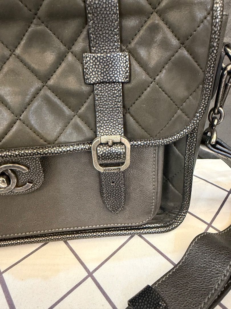 Chanel Quilted Leather Messenger Bag (Category: Luxury Bags & Wallets) located in Caloocan City. Submitted by piamariemo11606 (Listing ID 1463040704, Image 3). Description: - Authentic Chanel Messenger Bag - Color: Dark Grey - Material: Quilted Leather - Hardware: Silver - Features: Adjustable shoulder strap, interior zip pocket - Includes: Authenticity card - Serial number visible in photos.