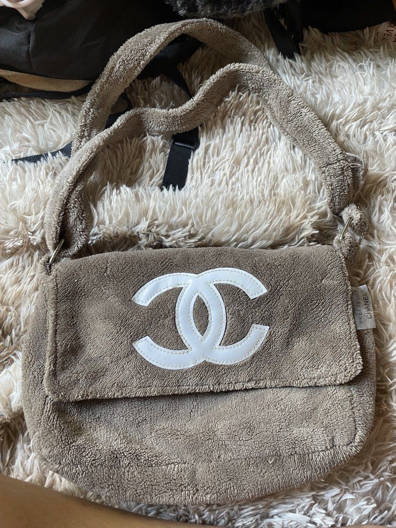 Chanel Terry Cloth Shoulder Bag (Category: Cross-body Bags) located in Santiago. Submitted by UkayLuxxSelector (Listing ID 1462902095, Image 1). Description: - Super cute Chanel shoulder bag - Made of soft terry cloth material - Iconic CC logo on the front - Satin lining with an interior zip pocket - Magnetic snap closure - Clear authenticity sticker inside - Ideal for casual outings.