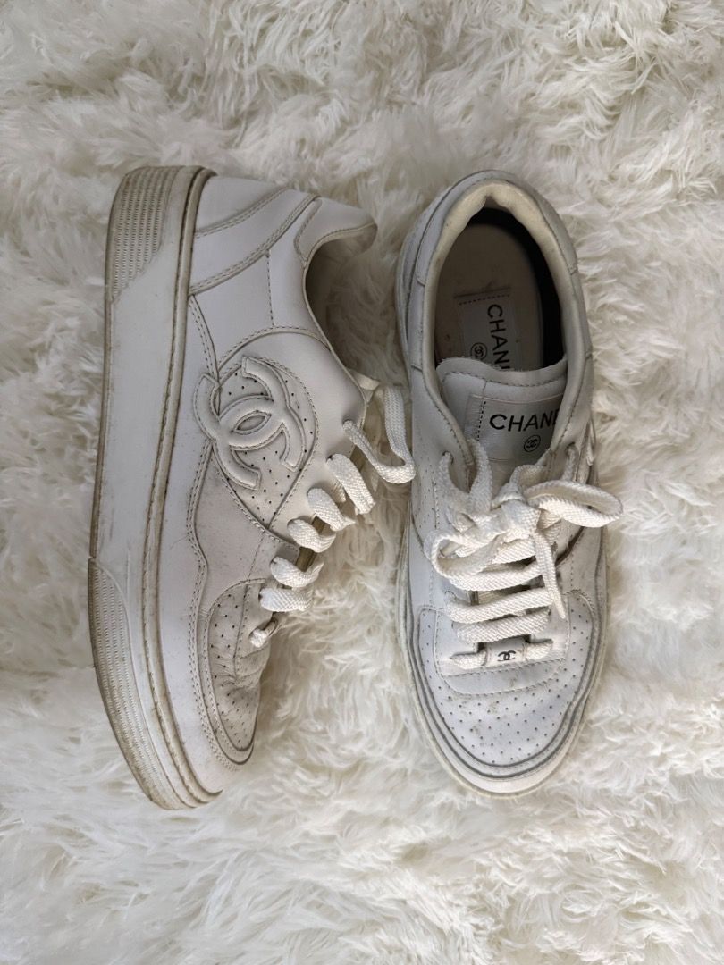 Chanel White Leather CC Logo Sneakers (Category: Sneakers) located in Quezon City. Submitted by ilabluxe (Listing ID 1462894881, Image 1). Description: - Authentic Chanel sneakers - will fit size 38 womens - White leather with iconic CC logo - Perforated toe box detail - White laces - Interior Chanel branding - Model number: W G45079 - just used once because a little small for me 100% Authentic or money back guarantee.