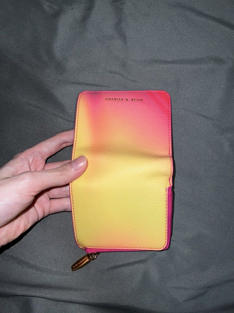 Charles & Keith Compact Wallet (Category: Wallets & Card holders) located in Mandaue City. Submitted by ddanaone (Listing ID 1463048694, Image 3). Description: - Used only twice - Quite tight for Philippine peso bills but it fits - Price is slightly negotiable - Size: 10cm (L) x 9cm (H) x 2cm (D).