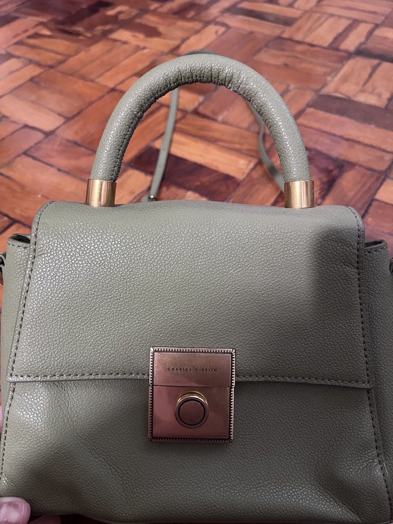 Charles and Keith Sling bag (Category: Cross-body Bags) located in Mandaluyong City. Submitted by skylistings_c (Listing ID 1462923106, Image 2). Description: New No issues Cute and good for casual .