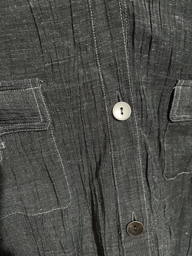 Cher Square Dark Grey Crinkled Button-Up Blouse (Category: Shirts) located in Marikina City. Submitted by femmeshoppemnl (Listing ID 1462937252, Image 3). Description: Cher Square Dark Grey Crinkled Button-Up Blouse Size: 2XL-3XL Condition: Used. See through. With working pockets. Issue: Minimal removable lints Brand: Cher Square Ukay sourced. Washed - Ready to wear. .