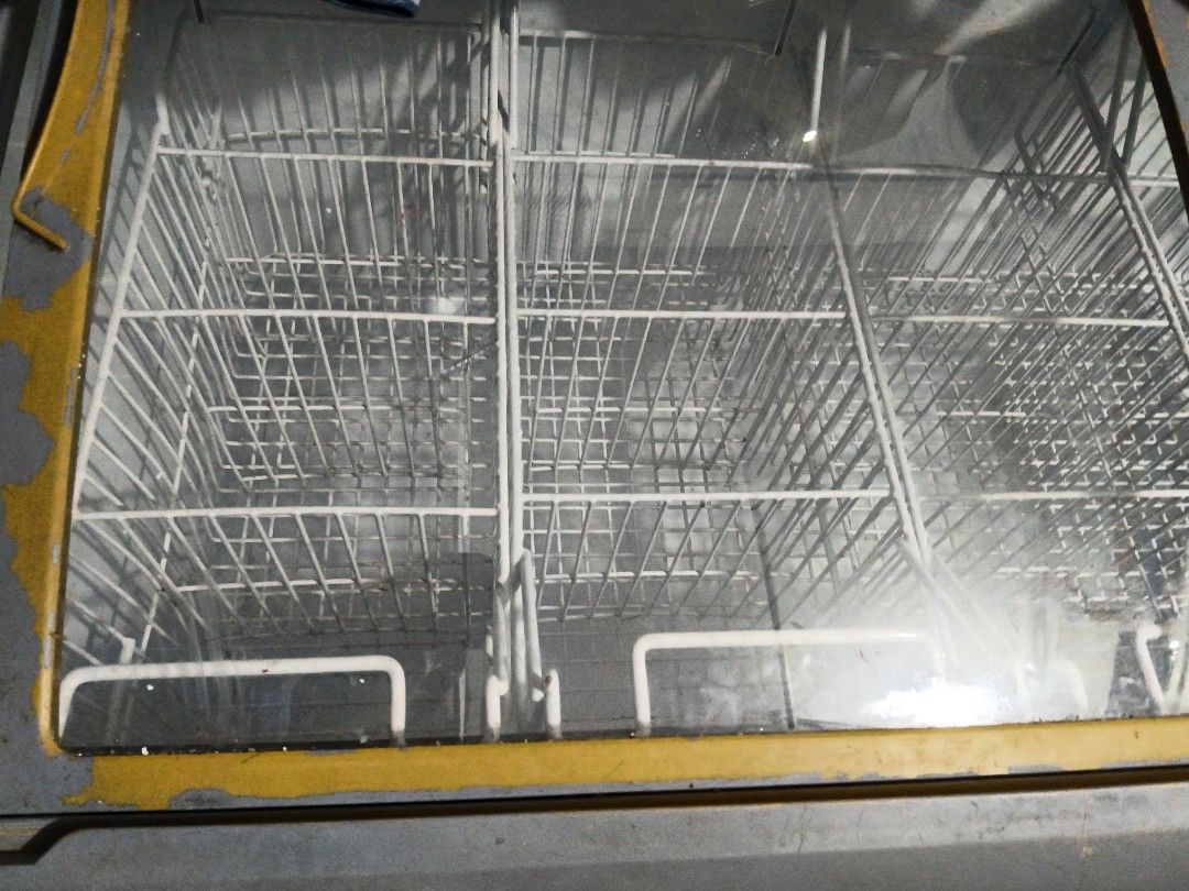 Chest Freezer with Glass Lid (Category: Refrigerators and Freezers) located in Manila. Submitted by daz_z (Listing ID 1463085823, Image 1). Description: - Chest freezer with clear glass lid - Two internal compartments - Ideal for home or business use - Fully functional and works well - Minor cosmetic imperfections: scuffs on exterior and yellowing around lid edge.