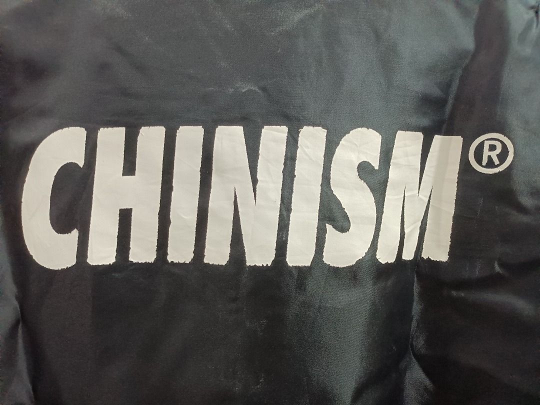 CHINISM BOMBER JACKET (Category: Coats, Jackets and Outerwear) located in Calamba. Submitted by rootsph (Listing ID 1462986860, Image 3). Description: Details: Fits 2XL to 3XL Dimes: 26W x 27.5L Color: Black Condition: Very good, print at the back has slight chipping, complete tags Please manage your expectation, item being sold is preloved and not brand new unless stated otherwise. Major and minor issues will be declared. Signs of usage and pres