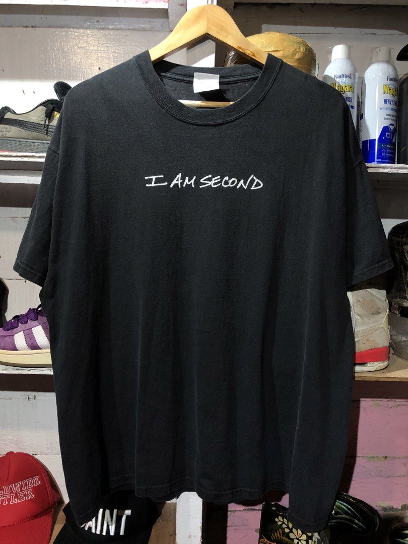 Christian apparel (I Am Second) graphic Tee (Category: Activewear) located in Manila. Submitted by talkshit-20 (Listing ID 1463085107, Image 1). Description: •Brand/Tag: Port & Company (Blue Swoosh Tag Era - Circa 2008-2015) •Size: Adult XL / TG / XG (Magandang pang-oversized fit) •Kondisyon: Good condition, may magandang natural fade ang tela (charcoal/washed black look). No major flaws. •Materyal: 100% Preshrunk Cotton (Makapal at matibay ang t