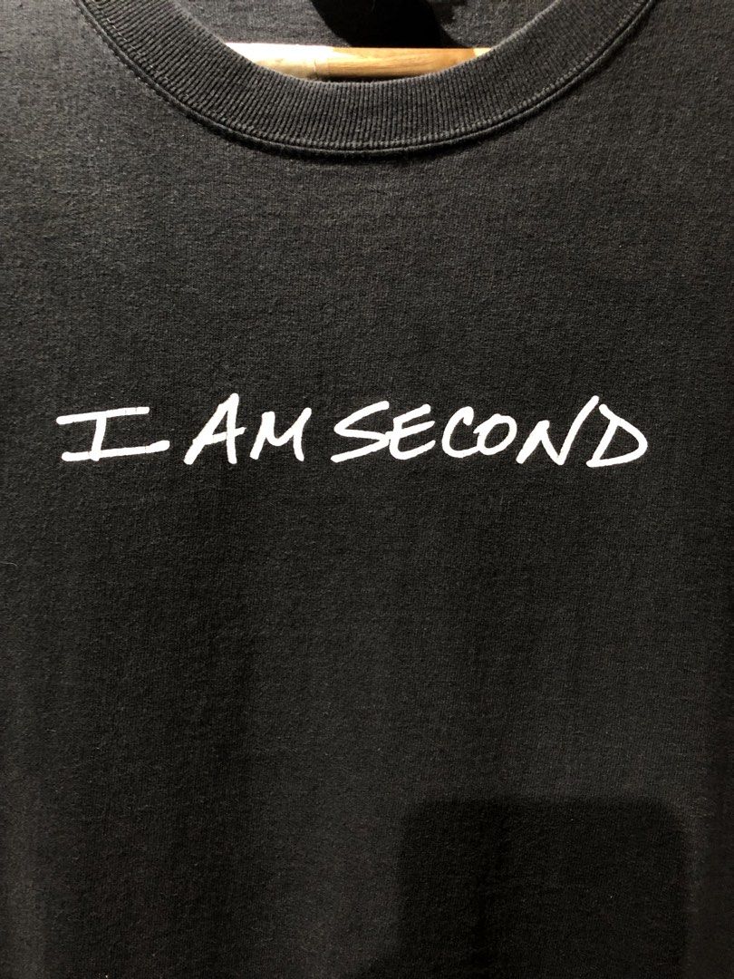 Christian apparel (I Am Second) graphic Tee (Category: Activewear) located in Manila. Submitted by talkshit-20 (Listing ID 1463085107, Image 2). Description: •Brand/Tag: Port & Company (Blue Swoosh Tag Era - Circa 2008-2015) •Size: Adult XL / TG / XG (Magandang pang-oversized fit) •Kondisyon: Good condition, may magandang natural fade ang tela (charcoal/washed black look). No major flaws. •Materyal: 100% Preshrunk Cotton (Makapal at matibay ang t