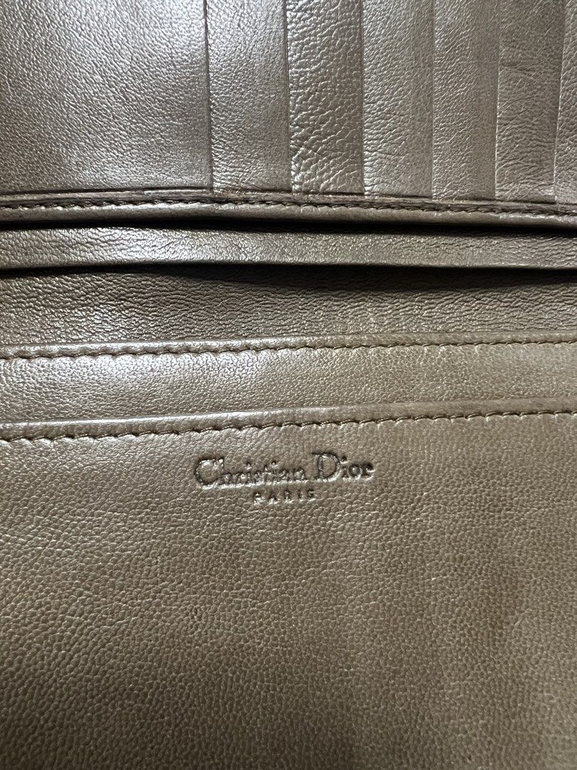 Christian Dior Brown Leather Wallet (Category: Luxury Bags & Wallets) located in General Trias. Submitted by mybag2025 (Listing ID 1463019220, Image 3). Description: - Authentic Christian Dior brown leather wallet - Iconic CD logo on the front - Multiple card slots inside - Zippered compartment for security - Classic and versatile design for everyday use - Shows some signs of wear, but fully functional.