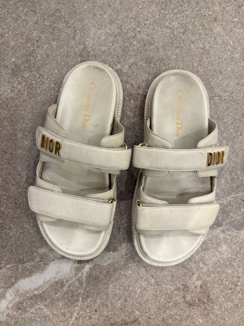 Christian Dior Leather Sandals Size 38 (Category: Flats & Sandals) located in Quezon City. Submitted by ilabluxe (Listing ID 1458391825, Image 3). Description: - Authentic white leather Dior sandals - Features iconic DIOR logo - Size: 38 Note this is used and you are not buying a brand new 100% Authentic or money back guarantee 100 % Authentic or Money Back Guarantee - with Dior Dust Bag.