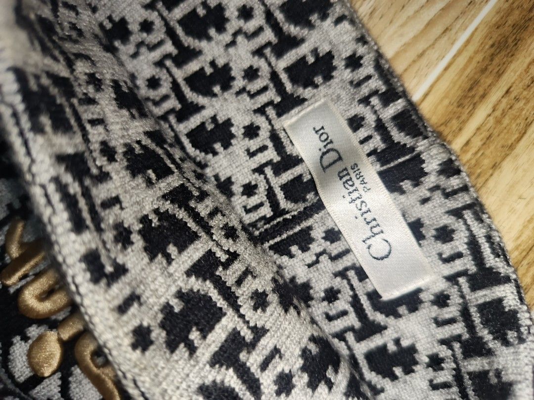Christian Dior Monogram Beanie Hat (Category: Hats & Beanies) located in Manila. Submitted by johnpaul248 (Listing ID 1463016506, Image 2). Description: - Classic Dior monogram beanie - Black and grey pattern - Iconic gold embroidered Dior logo on front - Made in Italy - Stylish accessory for any outfit.