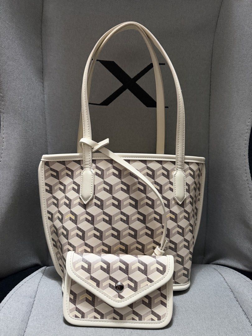 Christy Ng Mini Russo White (Category: Tote Bags) located in Davao. Submitted by tingz444less (Listing ID 1463087815, Image 1). Description: authentic complete set recently bought just has minimal stains on the bottom interior and minimal color transfer on the bottom liner but already cleaned and faded (unnoticeable) davao based.