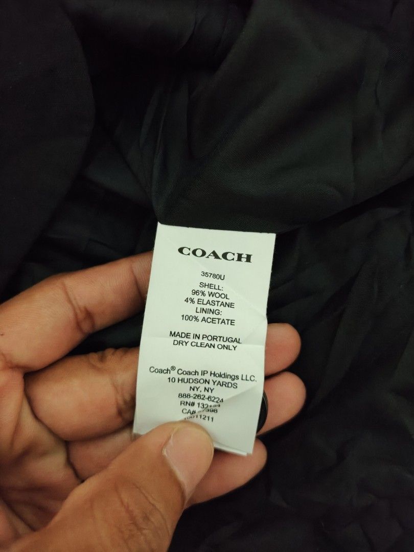 COACH Black Wool Blend Blazer Size S (Category: Coats, Jackets and Outerwear) located in Isulan. Submitted by jaysthrift (Listing ID 1462913182, Image 3). Description: - Classic black blazer from COACH - Made in Portugal - Material: 96% Wool, 4% Elastane (Shell); 100% Acetate (Lining) - Features: Three-button closure, two front pockets - Includes: Extra button - Versatile: Ideal for work or a night out -Kayo napo mag palit ng Button may extra pa 