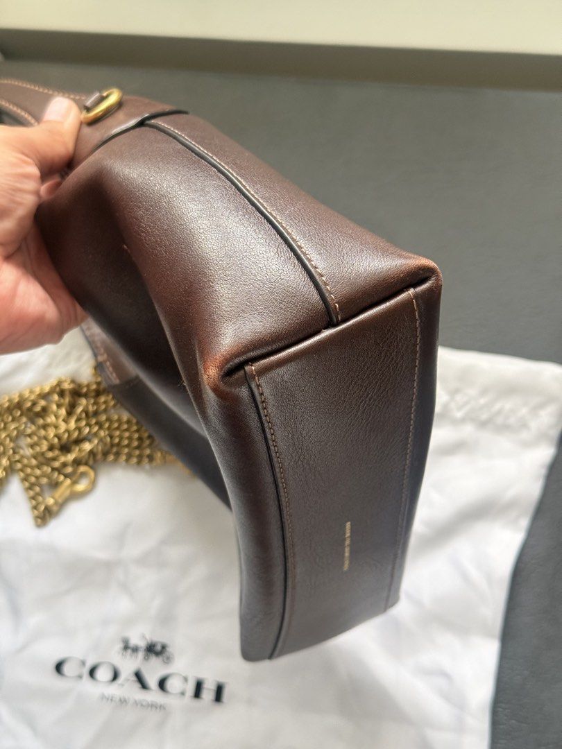 Authentic Coach Brooklyn 23 Brown Leather Shoulder Bag with Chain - Maple (Category: Luxury Bags & Wallets) located in Makati City. Submitted by quenniebee (Listing ID 1462897929, Image 3). Description: - Authentic Coach brown leather shoulder bag - Made with premium glovetanned leather - Features a stylish gold chain strap - Comes with original dust bag - Ideal for everyday use What you see is what you get 😊 📍Makati/Pasig/Nuvali.
