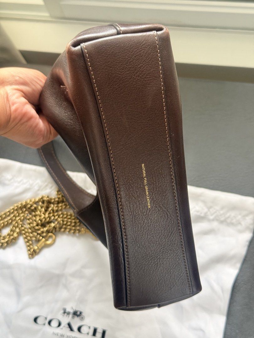 Authentic Coach Brooklyn 23 Brown Leather Shoulder Bag with Chain - Maple (Category: Luxury Bags & Wallets) located in Makati City. Submitted by quenniebee (Listing ID 1462897929, Image 2). Description: - Authentic Coach brown leather shoulder bag - Made with premium glovetanned leather - Features a stylish gold chain strap - Comes with original dust bag - Ideal for everyday use What you see is what you get 😊 📍Makati/Pasig/Nuvali.