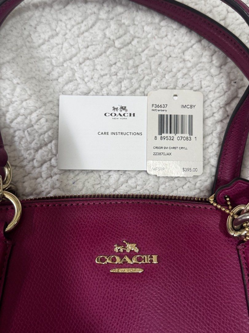 Coach Crossgrain Leather Small Christie Carryall (Category: Luxury Bags & Wallets) located in Santo Tomas. Submitted by gratefulsugar (Listing ID 1462915664, Image 2). Description: Coach Crossgrain Leather Small Christie Carryall in Cranberry Authentic Coach Small Christie Carryall in the beautiful Cranberry color. Made from durable crossgrain leather with a structured silhouette, gold-tone hardware, double top handles, and a practical zip-top cl