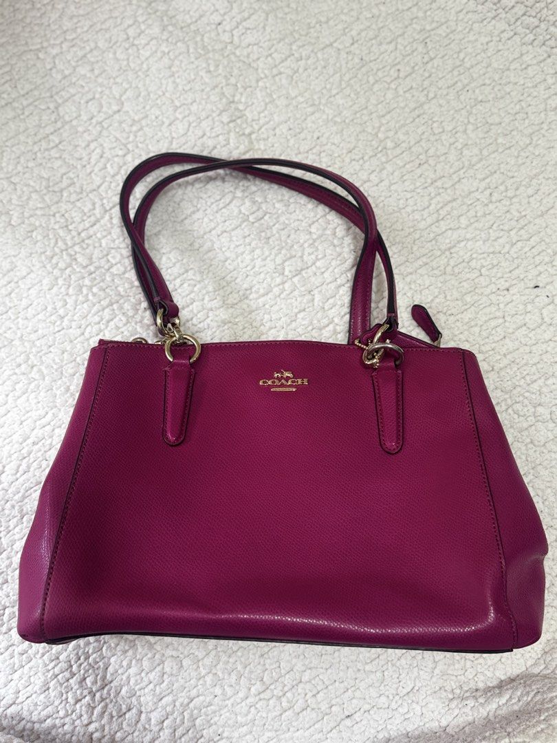 Coach Crossgrain Leather Small Christie Carryall (Category: Luxury Bags & Wallets) located in Santo Tomas. Submitted by gratefulsugar (Listing ID 1462915664, Image 1). Description: Coach Crossgrain Leather Small Christie Carryall in Cranberry Authentic Coach Small Christie Carryall in the beautiful Cranberry color. Made from durable crossgrain leather with a structured silhouette, gold-tone hardware, double top handles, and a practical zip-top cl