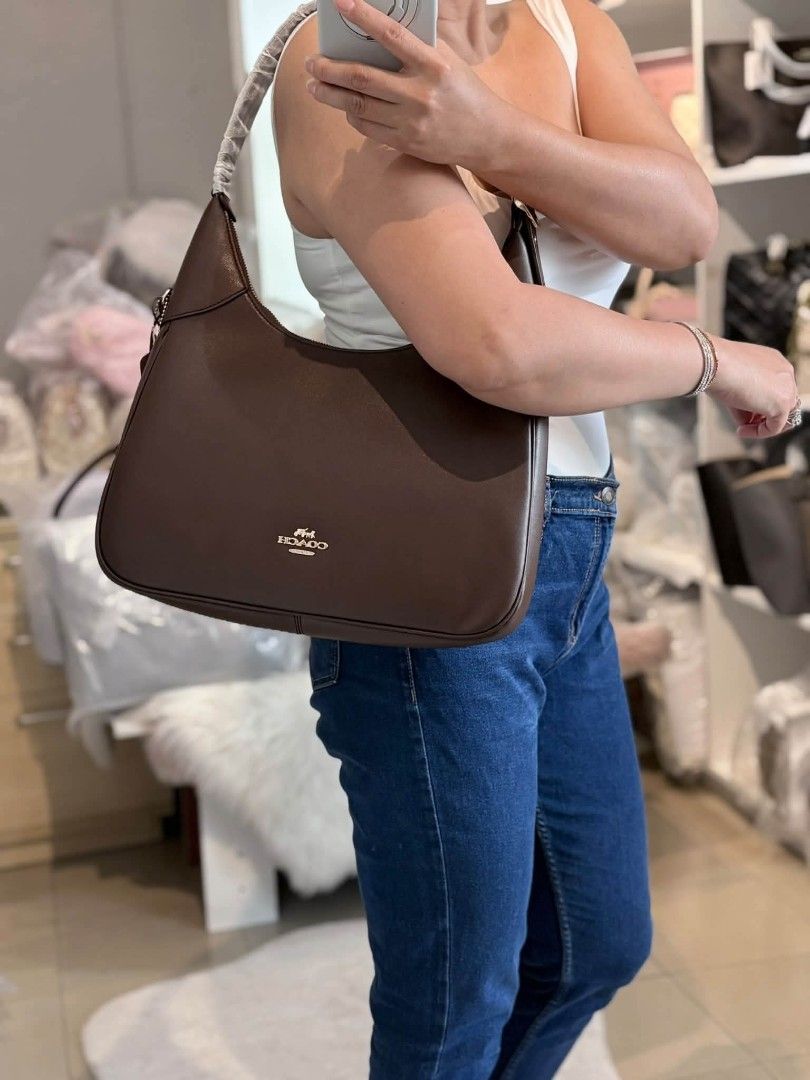 Coach Ella Hobo Shoulder Bag (Category: Shoulder Bags) located in Quezon City. Submitted by bagsboutiqueph (Listing ID 1462894331, Image 2). Description: LAST PRICE POSTED. LIMITED STOCKS! BRANDNEW WITH INCLUSIONS. COLOR MAY SLIGHTLY VARY IN ACTUAL DUE TO LIGHTING AND CAMERA SETTING. OTHER PHOTOS WILL BE SEND DURING PURCHASE AND FOR SURE BUYERS ONLY. WHEN IN DOUBT, DO NOT ORDER. THANK YOU..