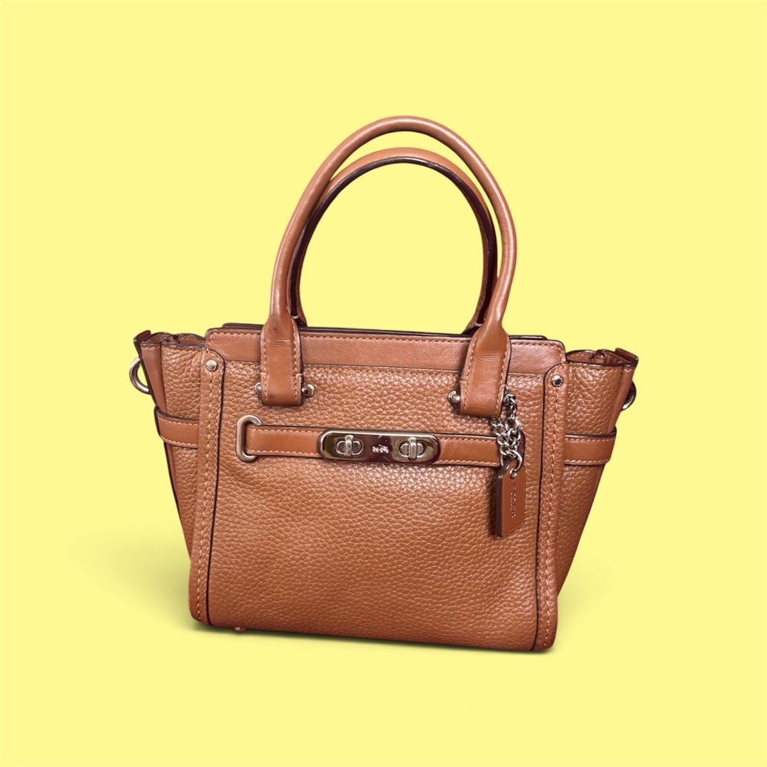Coach Swagger (Category: Luxury Bags & Wallets) located in Batangas. Submitted by missraee (Listing ID 1462319879, Image 1). Description: - super nice coach swagger in small size - with sling in excellent condition flaw: missing 1 silver hangtag.