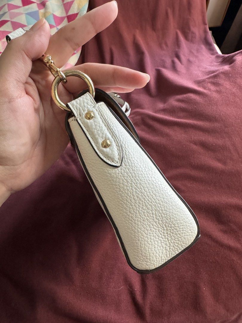 Coach White Cross Body Bag (Category: Cross-body Bags) located in Manila. Submitted by ganned (Listing ID 1462978272, Image 2). Description: Authentic Coach Crossbody Bag White In great condition. Photos are actuals Onhand. No discoloration, no transfer stain Hangtag present Rank A .