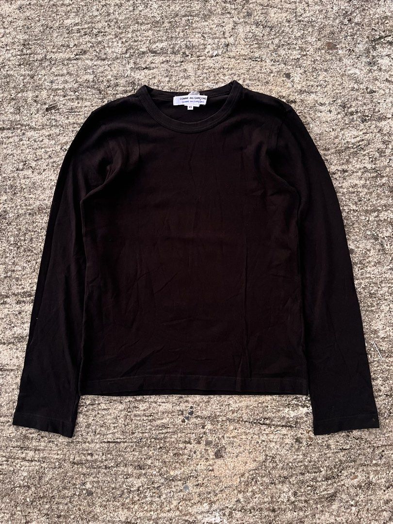 Comme des Garçons Black Long Sleeve (Category: Tshirts & Polo Shirts ) located in Quezon. Submitted by _sprezzatura (Listing ID 1463013154, Image 2). Description: Comme des Garçons Black Long Sleeve Size XS on tag Dimensions: Pit to pit - 16” Length - 23” Sleeve - 23” Shoulder - 13.75” Hem - 16.5” Excellent condition No issue Note: Feel free to ask questions before purchasing .