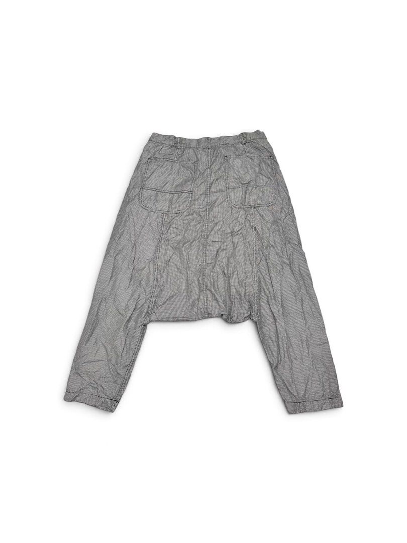 Comme des Garçons Homme Plus Houndstooth Drop Crotch Pants (Category: Luxury Apparel) located in Dumaguete. Submitted by overthrifted (Listing ID 1463111382, Image 2). Description: - Comme des Garçons Homme Plus houndstooth pants - Unique drop crotch silhouette - Features a YKK zipper closure - Size: L - Made in Japan - Perfect for a statement outfit 34x35 dimes.