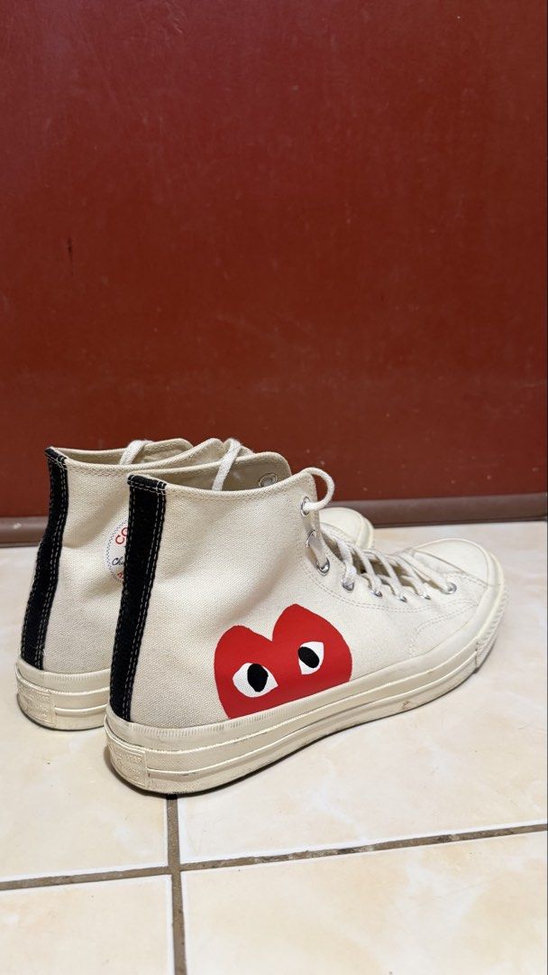 Converse x CDG HiCut White Chucks (Category: Casual Shoes) located in Manila. Submitted by sneakspxxks (Listing ID 1463022441, Image 2). Description: Worn a few times as evident on the soles Need reglye .
