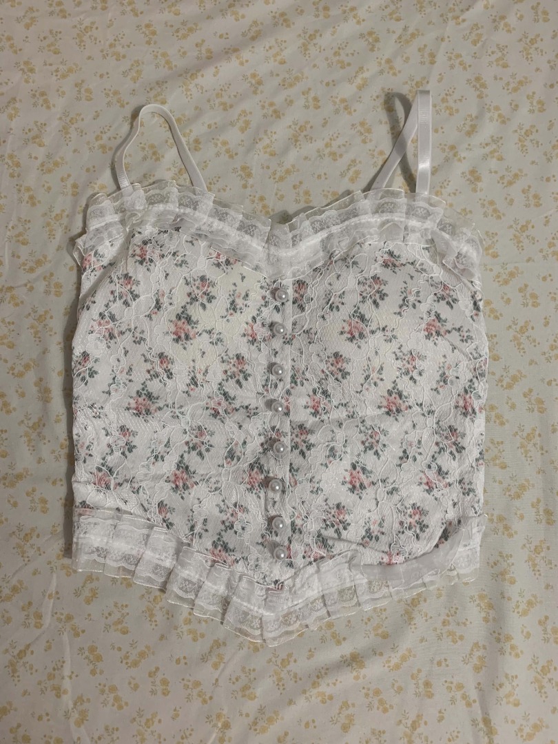 coquette white padded tank top (Category: Sleeveless) located in Antipolo. Submitted by luckycloud.d (Listing ID 1463082545, Image 1). Description: Used only 1-2 times Padded, very comfy! Can fit S-Med Payment: GCash or Maribank.