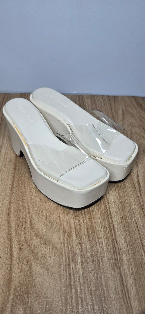 Cotton Candy White Platform Wedge Sandals (Category: Wedges) located in Manila. Submitted by chubbychic553 (Listing ID 1462929082, Image 1). Description: - Brand: Cotton Candy - Color: White - Style: Platform Sandals - Strap: Clear strap across the front - Heel: Wedge heel design - Size: 40 factory defect ndi na naibalik sa supplier glue stain meron na din scratches pero walang tuklap or bakbak php 400 .