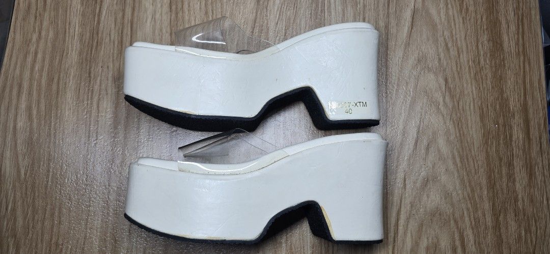 Cotton Candy White Platform Wedge Sandals (Category: Wedges) located in Manila. Submitted by chubbychic553 (Listing ID 1462929082, Image 3). Description: - Brand: Cotton Candy - Color: White - Style: Platform Sandals - Strap: Clear strap across the front - Heel: Wedge heel design - Size: 40 factory defect ndi na naibalik sa supplier glue stain meron na din scratches pero walang tuklap or bakbak php 400 .