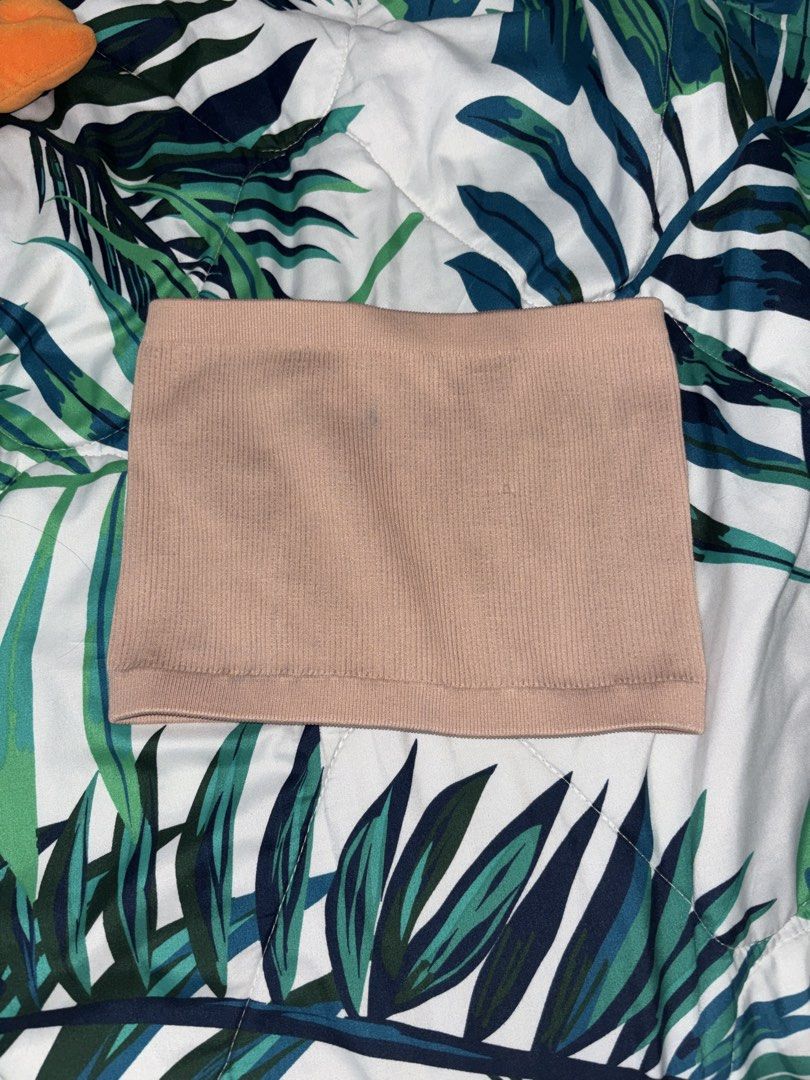 Cotton On Ribbed Tube Top (Category: Sleeveless) located in Manila. Submitted by beelvrd (Listing ID 1462995825, Image 1). Description: - Basic pink ribbed tube top - Stretchy material for a comfortable fit - Perfect for layering or wearing on its own - Small blue mark on the front (as shown in the photo) - .