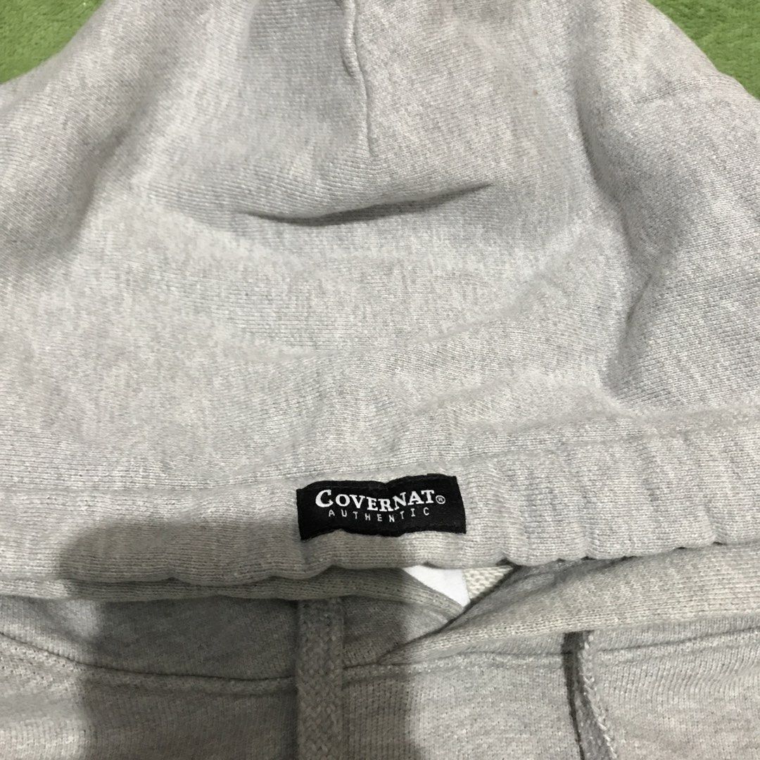 COVENANT Grey Hoodie with Blue Logo (Category: Hoodies) located in Polomolok. Submitted by paollette1214 (Listing ID 1463039797, Image 3). Description: - Grey hoodie from COVENANT - Features 'COVENANT' blue arched logo on the front - Includes a front pocket and a hood - Small embroidered logo detail on the sleeve - Ideal for everyday casual wear.